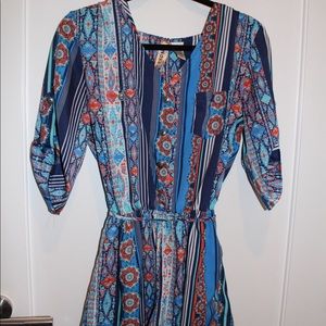Blue and orange patterned romper